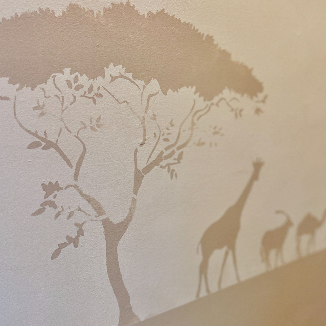 Savanhah tree and Safari animals pattern painted on wall