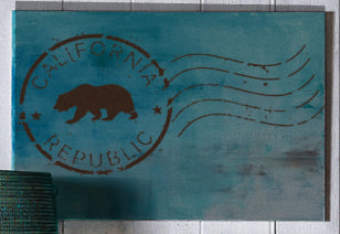 stenciled Black Bear California Republic Stamp painted on wood as wall art