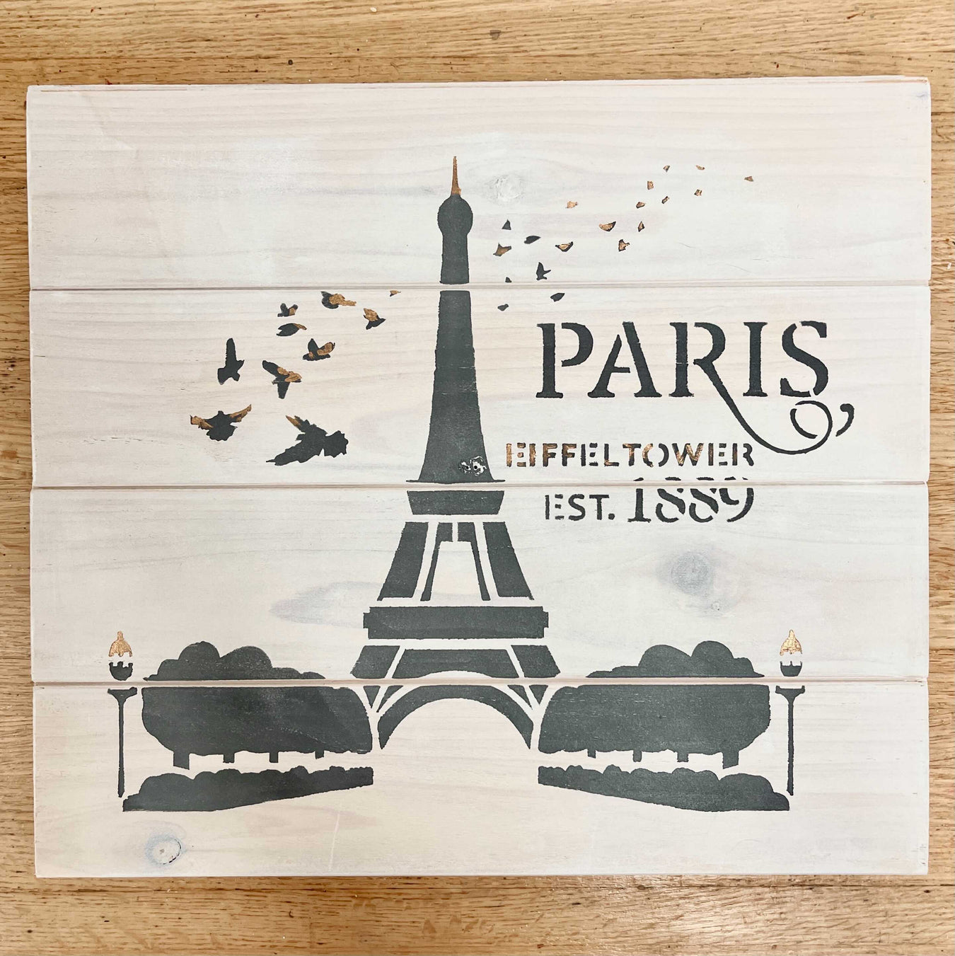 stenciled Eiffel tower in Paris painted on wood