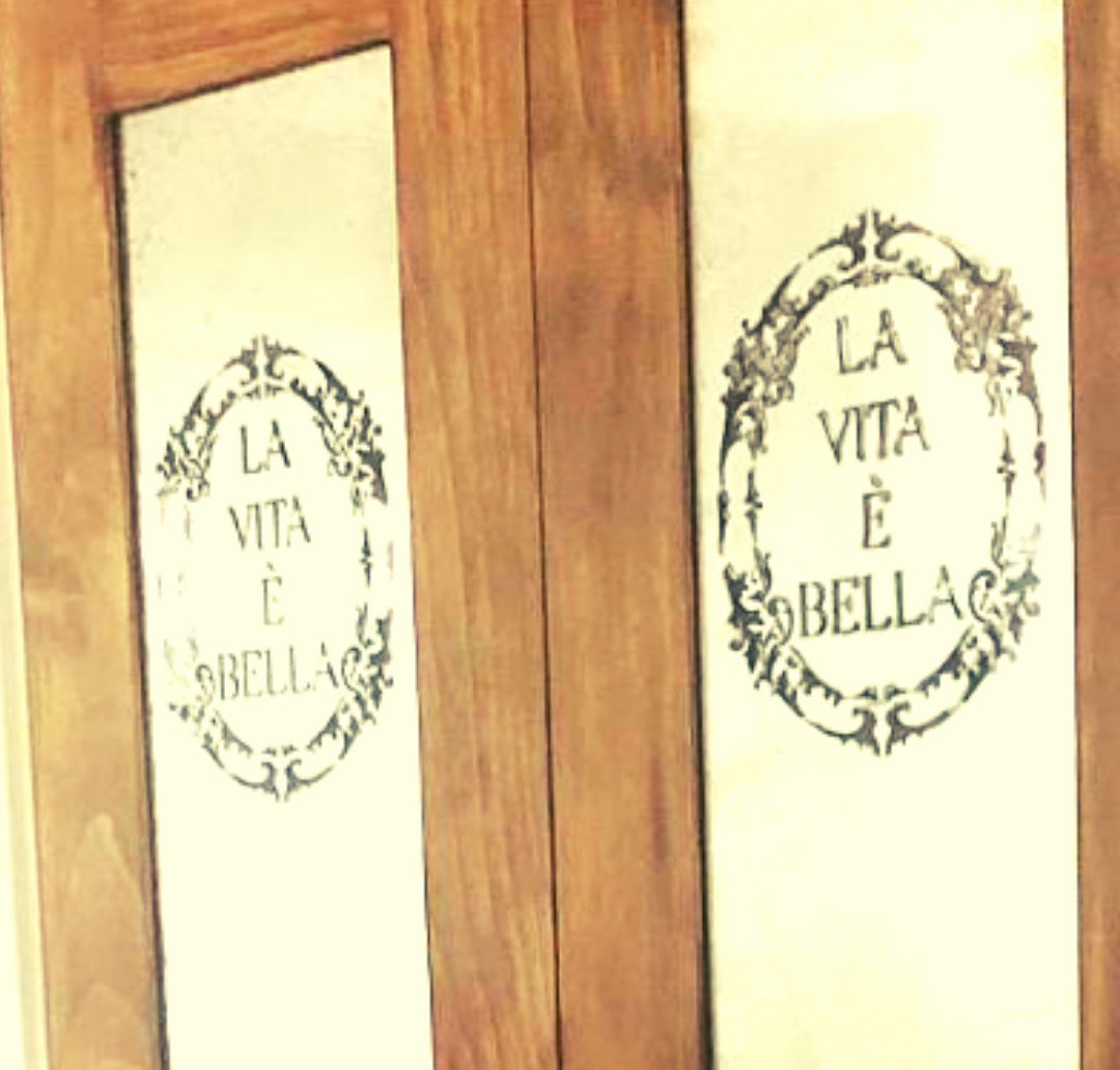 La Vite e Bella or Life is Beautiful Italian Phrase painted on door panels