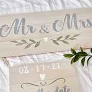 Mr & Mrs words with heart and leaves branches painted on wood using stencil