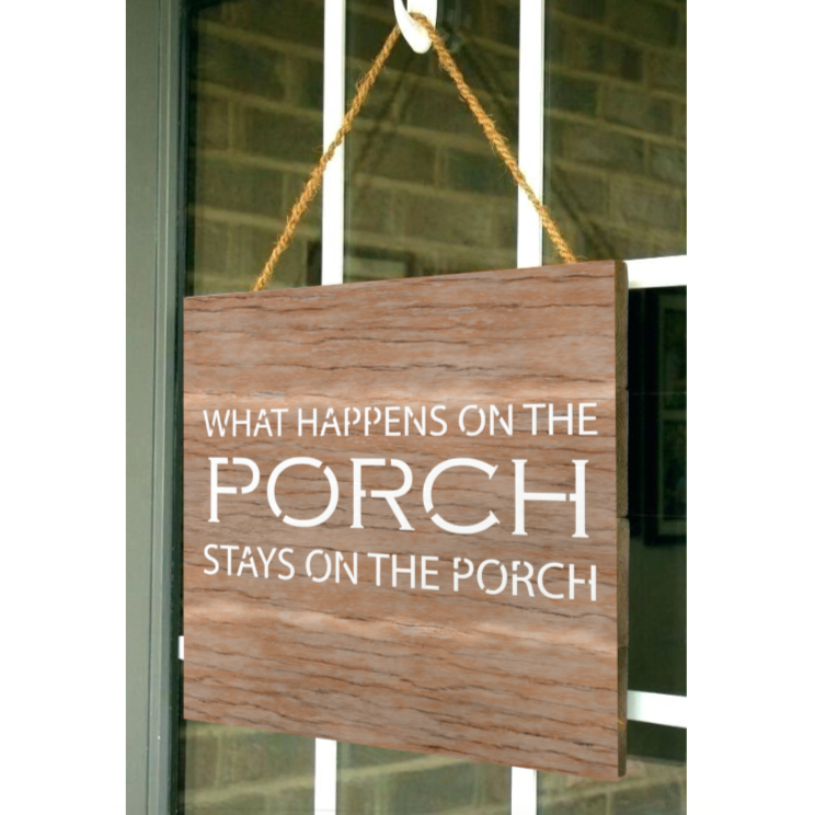 wooden porch sign painted with "what happens on the porch stays on the porch"