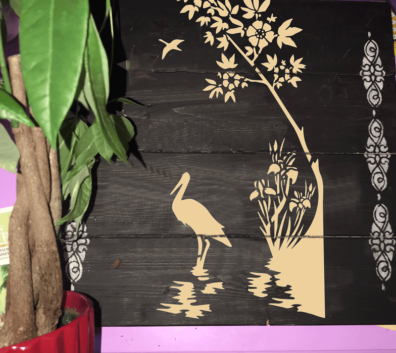 stenciled pelican bird stencil painted on wood