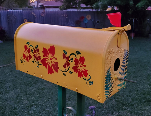 mailbox painted with hibiscus stencil